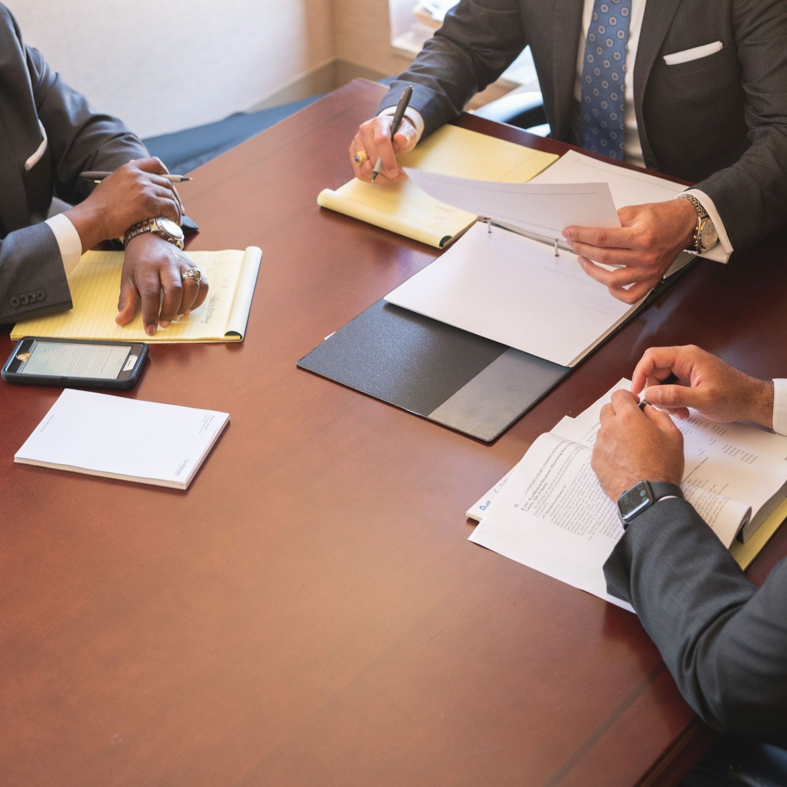 Attorneys meeting around a table